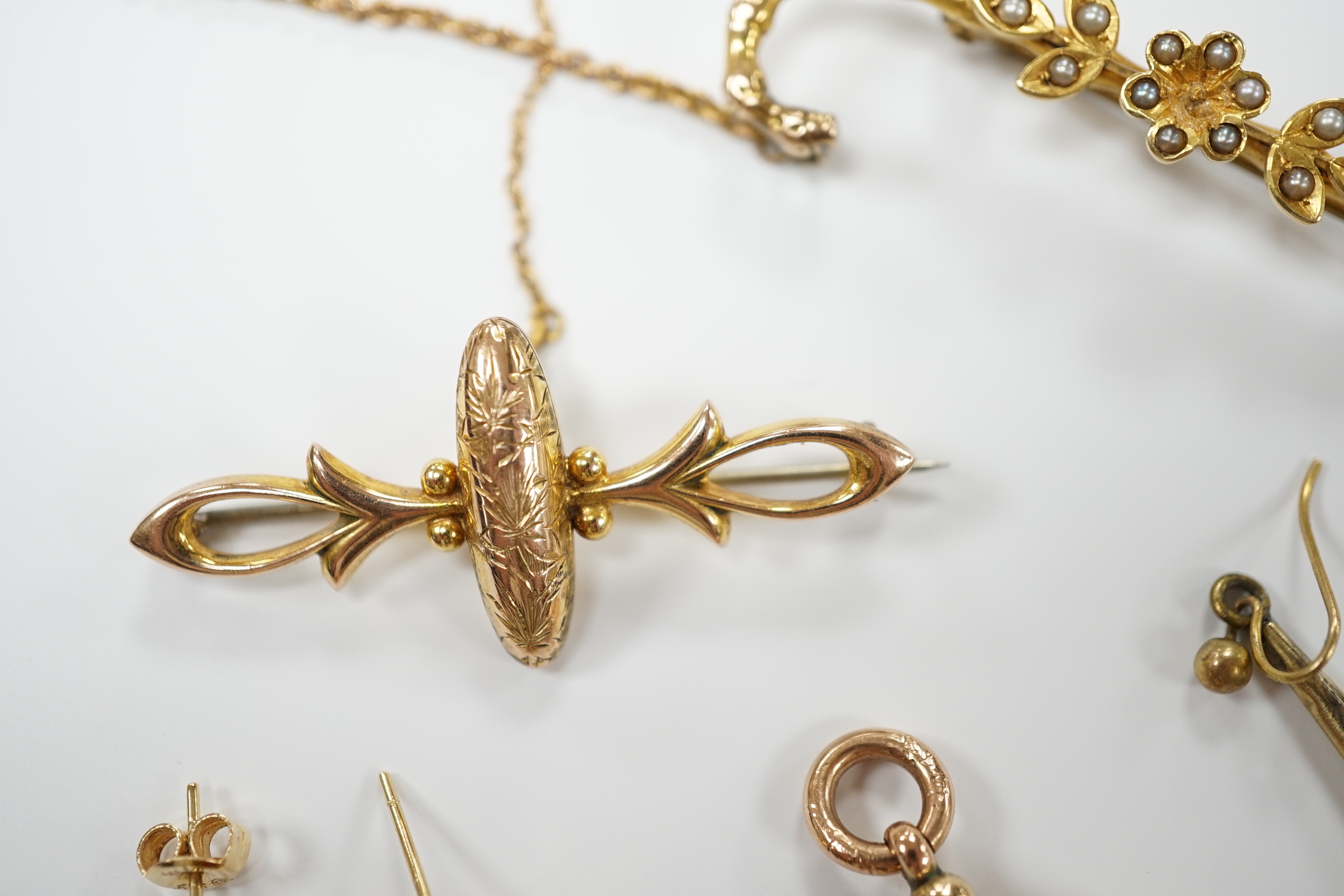 A group of Victorian and later jewellery including a yellow metal overlaid, carnelian and bloodstone set fob, yellow metal and seed pearl set cane bar brooch, earrings, ring etc.